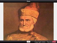 Close-up of the portrait showing facial details, color, and texture of painting.