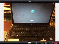 Open HP Envy dv7 showing HP logo on boot screen