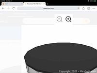 Front view of the black circular pool cover stretched, showing reinforced edges.