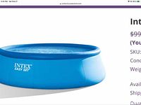 Front view of assembled blue Intex Easy Set pool against white background.