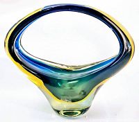 Front view of the mid century Scandinavian art glass vase showing the open oval form and color gradient from yellow to green and blue.