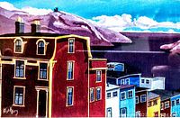 Close-up of printed image showing colorful houses and artist signature