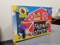 Front view of the box showing the brown horse rider toy and recommended age 18 months plus.