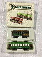 Original box with two vintage classic streetcar trolleys inside display tray