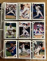 Page of baseball cards inside binder showing 9 individual cards including players in MLB uniforms from the late 80s to early 90s, including various teams like Pirates, Padres, Phillies, Mariners, Orioles, Astros, and Angels.