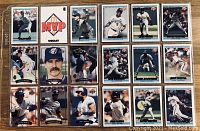 Photo showing 15 baseball cards laid out in a grid, featuring various players mostly in action in Toronto Blue Jays uniforms, plus a McDonald's MVP checklist card.