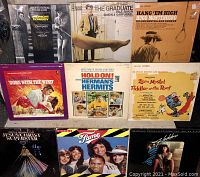 Photo showing nine vintage movie and musical soundtrack LP covers, including The Graduate by Simon & Garfunkel, Hang Em High, Gone With the Wind, Hold On! by Hermans Hermits, Fiddler On The Roof, Jesus Christ Superstar, Fame, and Xanadu by ELO.