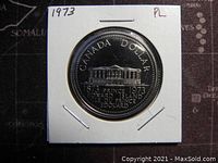 Reverse side showing Prince Edward Island commemorative design with building and inscriptions.