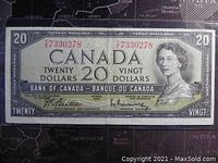 Front side of the 1954 Bank of Canada twenty dollar banknote with serial number E7330278 and Queen Elizabeth II portrait.