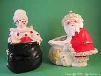 Front view of Mr. and Mrs. Santa Claus Napco ceramic planter figurines, showing detailed features and paint wear