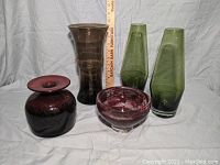 View showing all five vintage Scandinavian art glass pieces together with measuring stick for scale.