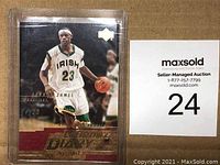 Front view of the LeBron James 2003-2004 Upper Deck LeBron's Diary basketball card in protective case showing LeBron in Irish college jersey number 23 and LeBron's Diary text.