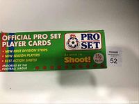 Close-up of right side of green Pro Set box showing branding and marketing text including 'Official Pro Set Player Cards', 'Endorsed by the Football League', and pricing in pence and Irish pence.