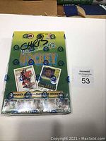 Front and angled view of the unopened 1992 Premiere Hockey wax box showing box design and pack images.