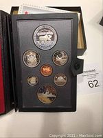 Photo of the full 1985 Canadian proof coin set in black case showing all seven coins.