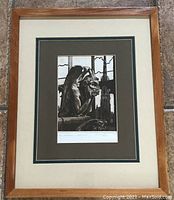 Framed zinc etching titled "Coventry Mirage" by Heather Cragg showing the full artwork and frame on a tiled floor.