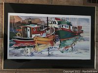 Full front view of framed print showing three fishing boats at harbor with reflections