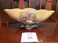 Oval-shaped Royal Winton Grimwades Thames Gondola vase with floral design displayed on a wooden table.