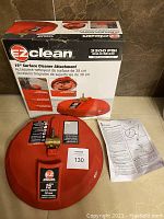 EZ Clean box and 15-inch surface cleaner attachment with instruction sheet, showing front and top view.