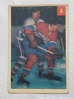 Front photo of the 1953 Parkhurst Eddie Mazur rookie card showing Mazur in Canadiens uniform in-game action pose.