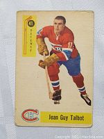 Front side of Jean Guy Talbot hockey card showing player image, team logo, and card number 41 in red Canadiens uniform.