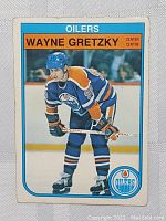 Front view of 1982 O-Pee-Chee Wayne Gretzky Oilers hockey card featuring player image and team name.