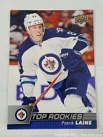 Front side of Patrick Laine rookie card showing player image in Winnipeg Jets uniform and Upper Deck branding