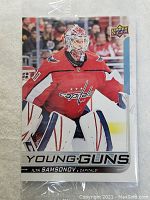 Front side of Ilya Samsonov Young Guns rookie hockey card in packaging, showing player in Capitals uniform and card branding.