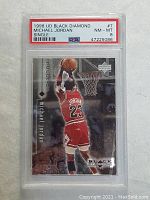 Front of the 1998 Upper Deck Black Diamond Michael Jordan basketball card in PSA graded slab, showing Jordan dunking in Chicago Bulls uniform.