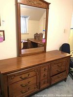 Front view of dresser with mirror installed