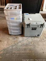 Plastic mini chest with five drawers and organizer top beside gray K2 cooler