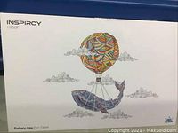 Closed box of Huion Inspiroy H950P pen tablet showing colorful balloon and whale graphic.