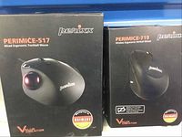 Photo of the boxes for the two Perixx ergonomic trackball mice: PERIMICE-517 wired model and PERIMICE-719 wireless model