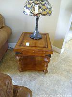 Full top and side view of wooden side table with a lamp on top (lamp not included)