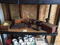 Shelf view showing all tools and boxes arranged side by side