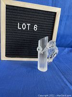 Front view of crystal woodpecker sculpture with frosted trunk.