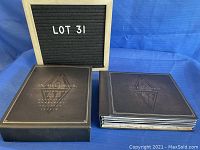 Photo of the box and game cases showing lot 31 sign