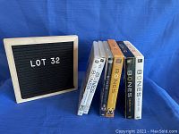 Six season DVD boxed sets of the Bones TV series arranged standing in a row showing labels.