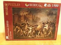 Box front for Les Sabines Ricordi puzzle showing classical painting and 1500 piece count