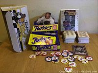 Full layout photo showing unopened Parkies Tall Boys packs, two Parkies boxes, 1997-1998 Beehive oversized cards, collector coins, and Gordon Howe insert.
