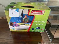 Front view of one Coleman ComfortSmart QuickBed air mattress box, showing branding, product image, and specifications.