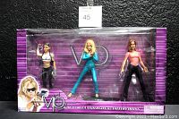 Full boxed set showing three VIP action figures by Play Along, new sealed in original packaging with purple background and character photos.