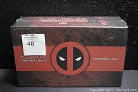 Front view of sealed Deadpool Merc With A Mouth Collectibles & Gear box, showing Deadpool logo and branding.