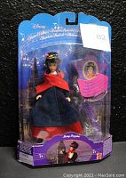 Photo of the 1994 Mattel Disney Mary Poppins 7 inch doll in original sealed packaging with musical stand and hairbrush.