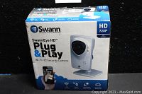 Front view of the original SwannEye HD Plug & Play Wi-Fi HD Security Camera box featuring the HD 720P logo, product image, and smartphone view illustration.