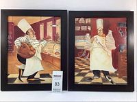 Both framed glass prints by Susan Eby shown side by side with visible caricature chefs and kitchen backgrounds