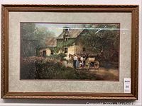 Framed artwork in a rustic scene with carriage and person outside a house.