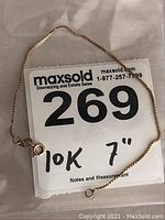 Top view of the bracelet laid flat showing overall length and chain link type.