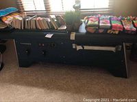 Front view showing entire table with vinyl top and base