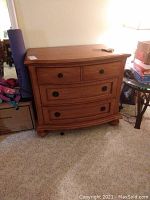 Frontal view of the Lane chest showing drawer design and finish.